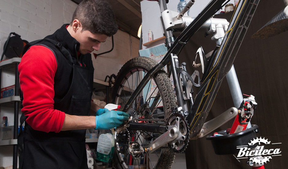 Mechanic repairing a mountain bike