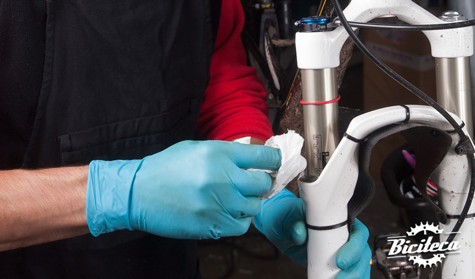 Mechanic doing the maintenance of a bike